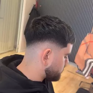 Portrait of AKN The Barber