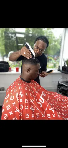 Hermanos hairsalon logo